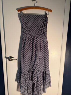 Strapless polka dot dress with high low ruffle hem